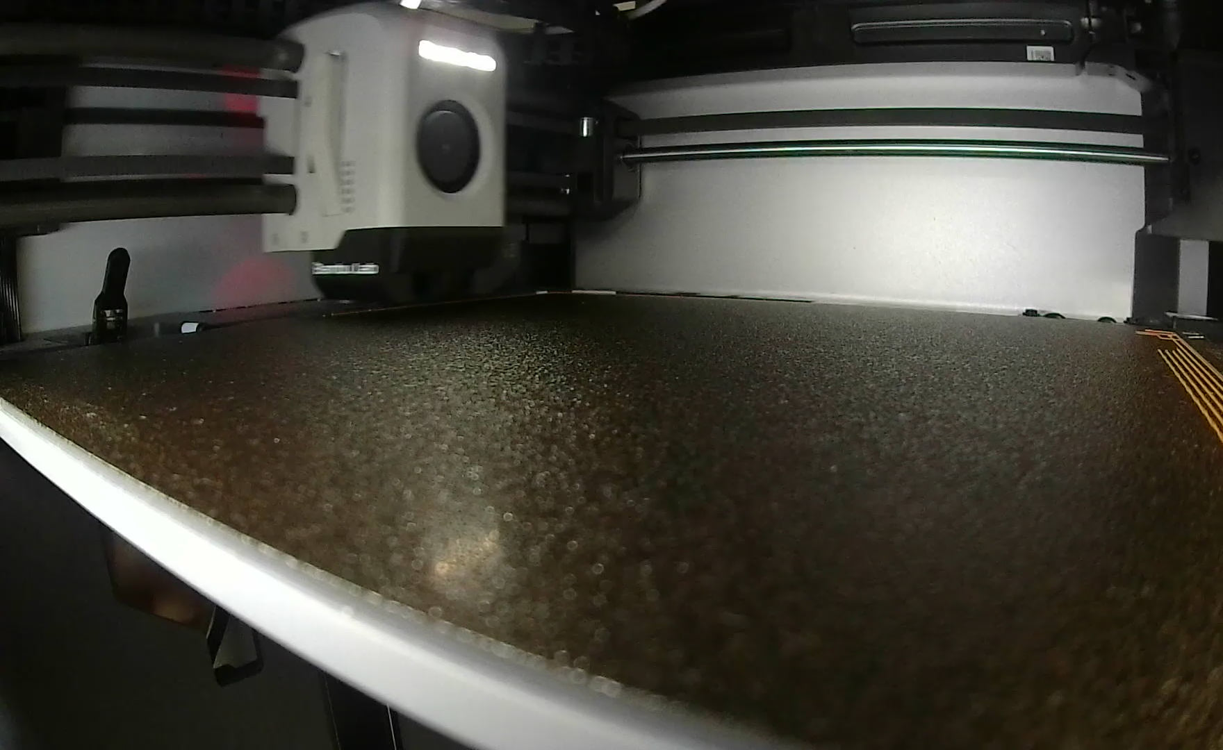 Load video: A video showing a 12 second timlaspe of a bambu-lab 3d printer printing apprx. 20 rainbow llamas